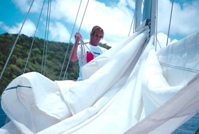 Captain Dave lowering main sail